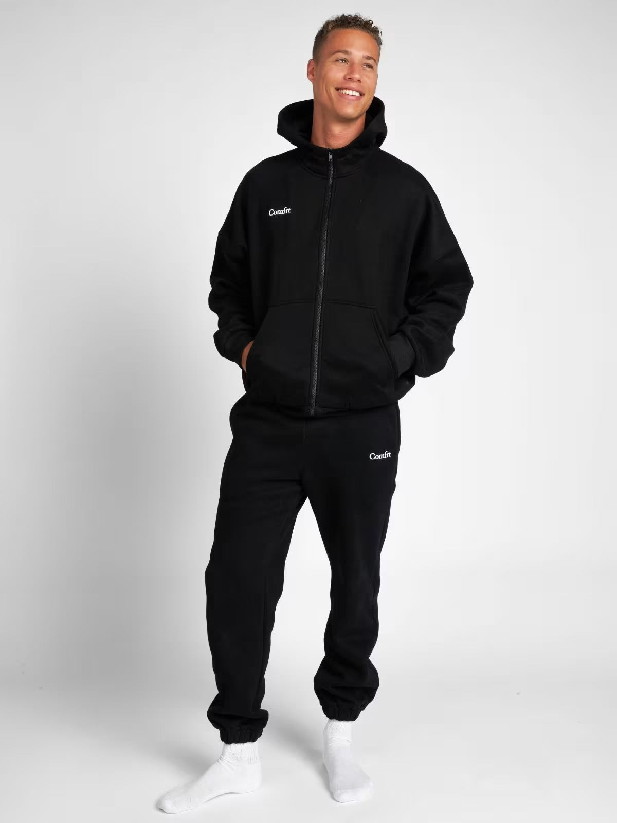 Conjunto de chándal negro unisex con cremallera